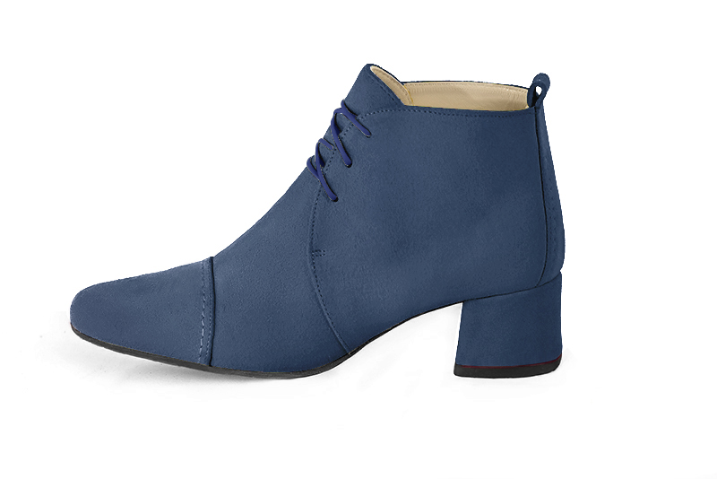 Denim blue women's ankle boots with laces at the front. Round toe. Low flare heels. Profile view - Florence KOOIJMAN